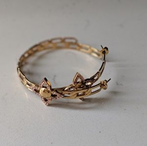 Gold flower power Louis Vuitton hoops